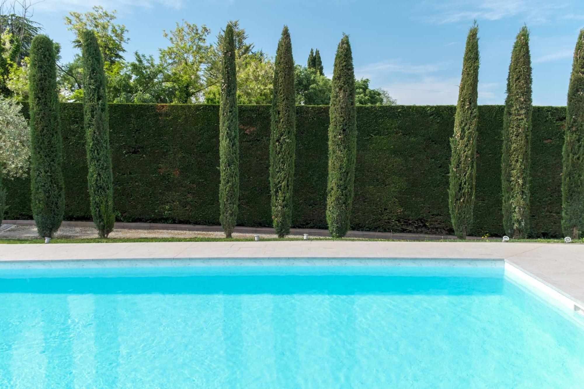 Villa Carini With 3000 Mq Garden & Heated Pool Кастелнуово дел Гарда Екстериор снимка